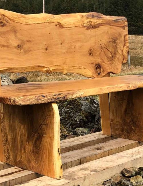 A bespoke hand made wooden bench by Wood Art